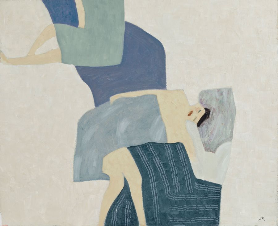 two figures lying on blankets on a beach.