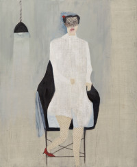 figure in white dress and veil on black chair.