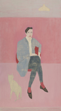 person sitting on chair against a pink background with a cat.
