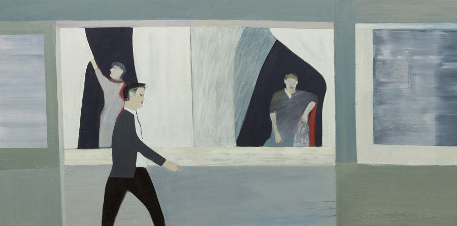 person walking past figures in windows.