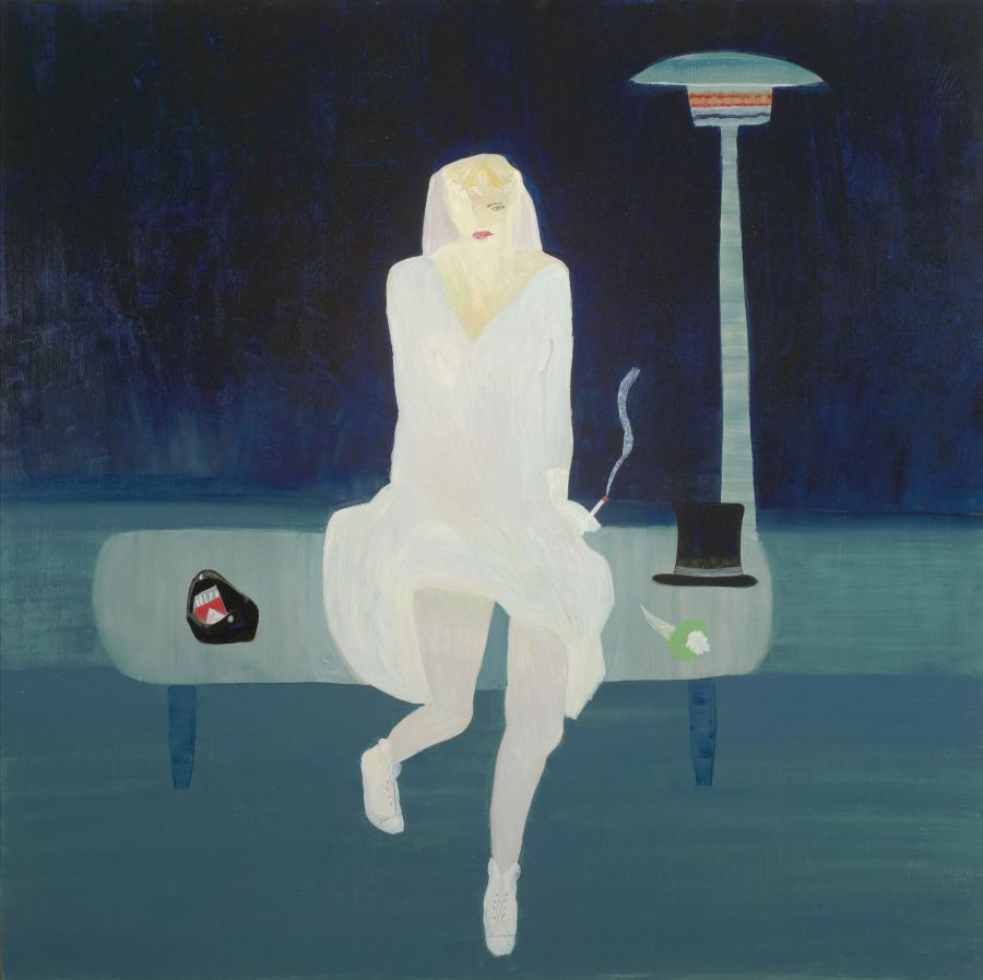 a figure in white with a veil, smoking, sitting on a bench against a dark background.
